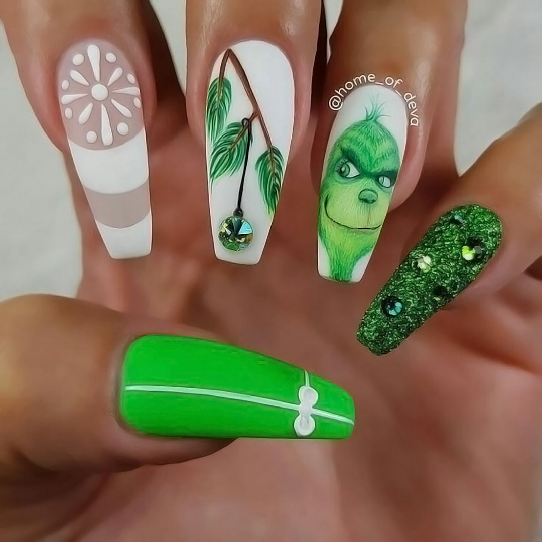Nails with a Grinch design.