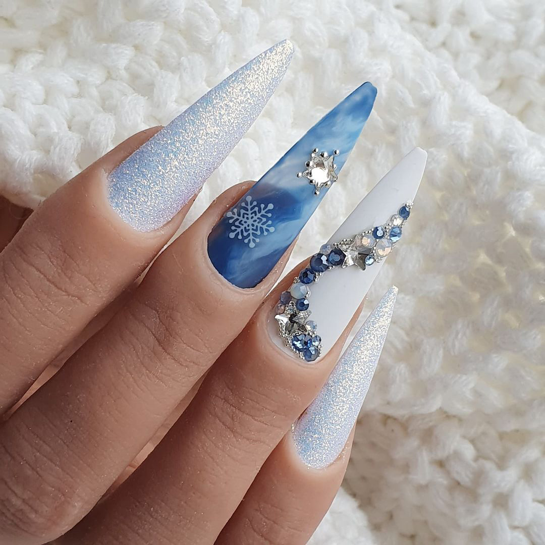 Nails with crystal icy blue design.