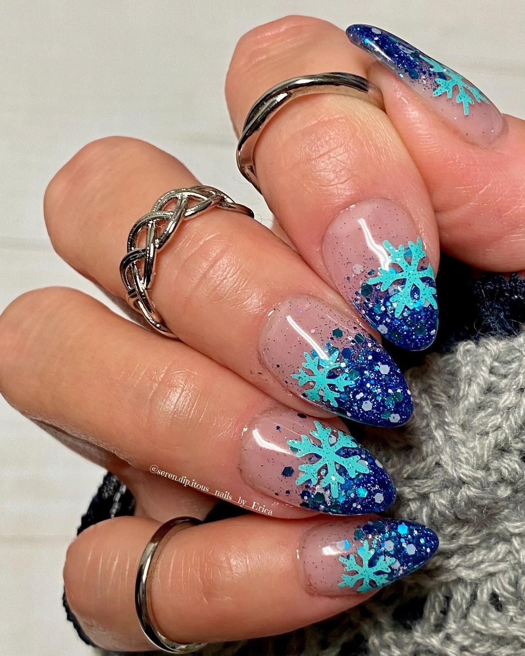 Nails with icy blue design.