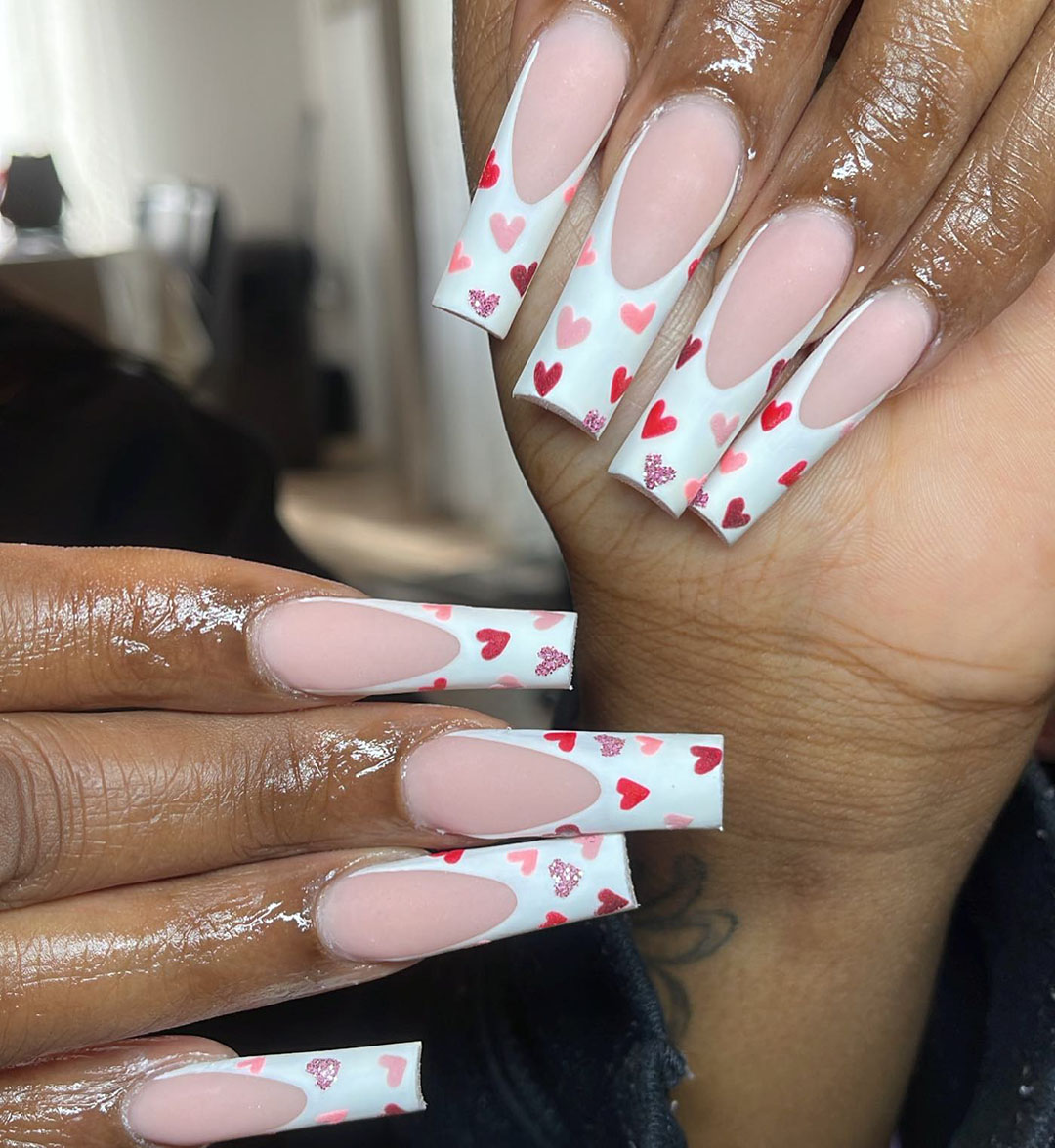 nail art with checkered hearts design.