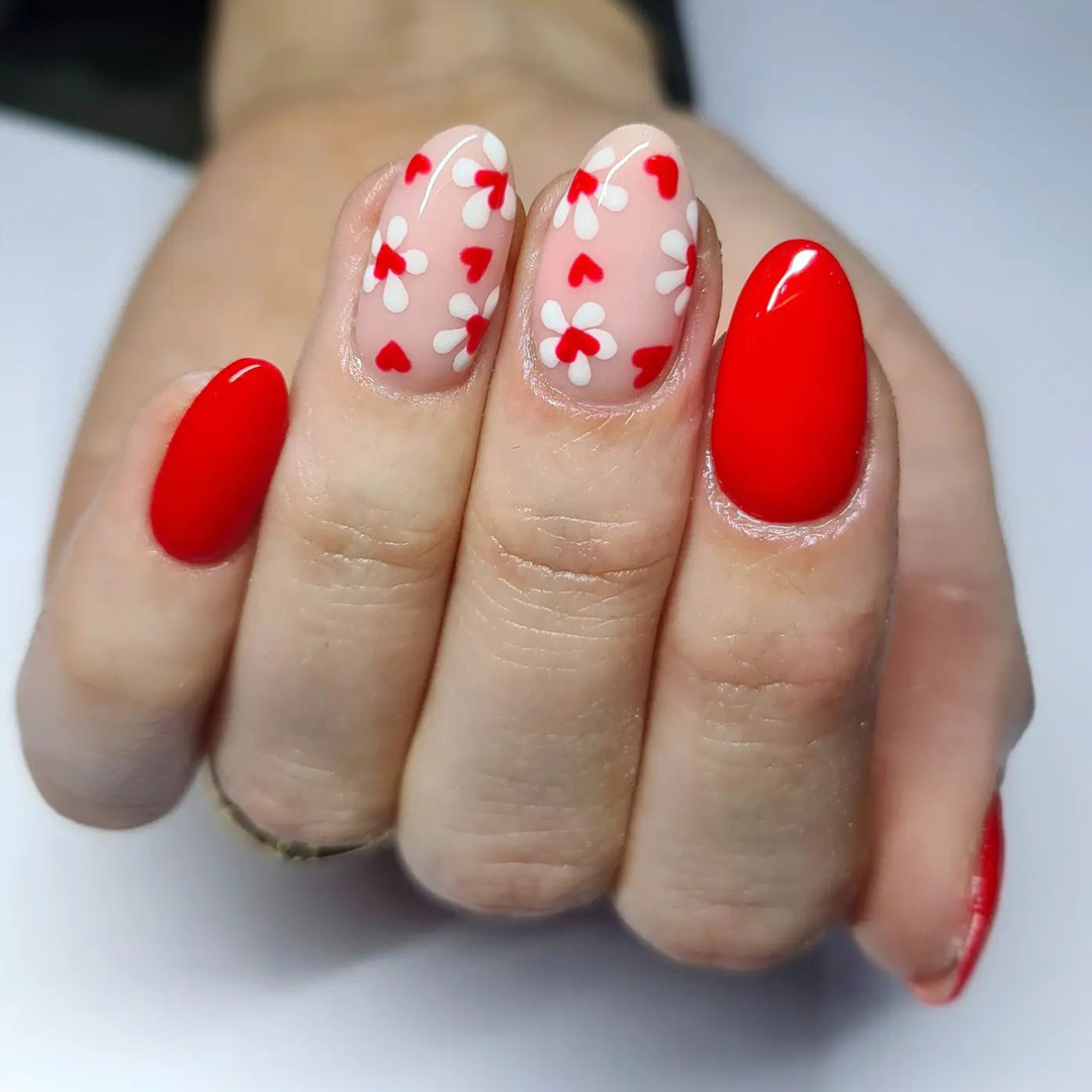 nail art with flowers and hearts design.
