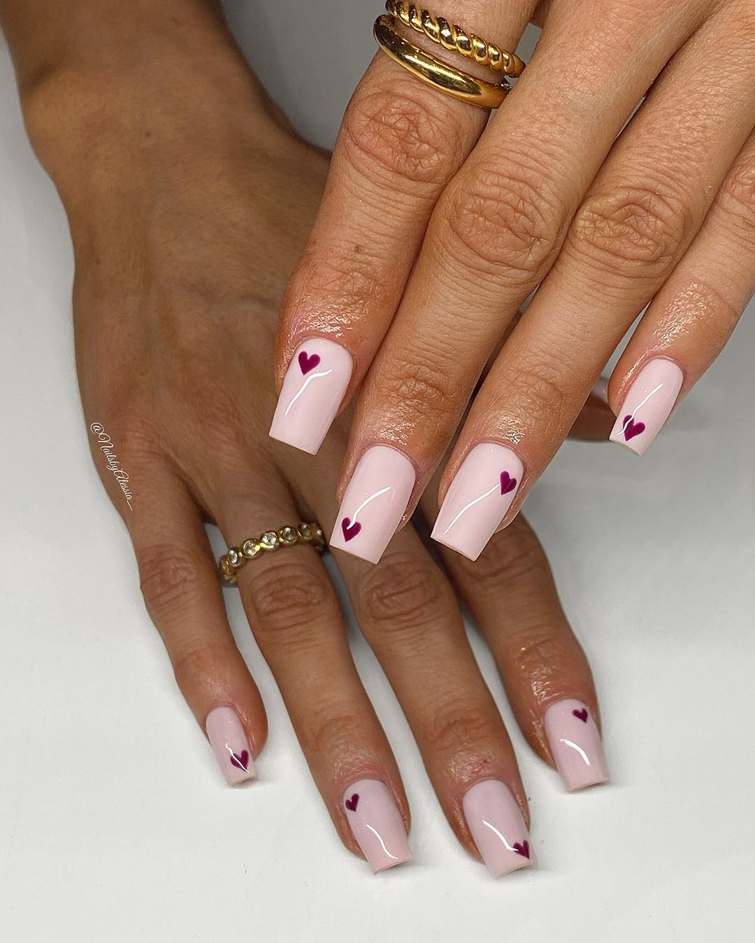 nail art with simple hearts design.