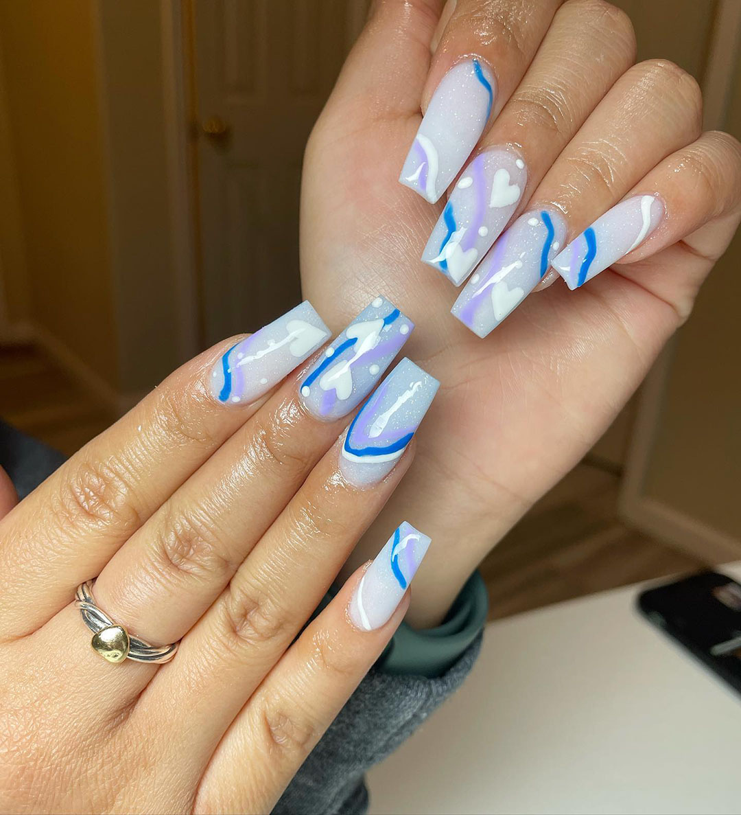 nail art with sky blue valentines design.