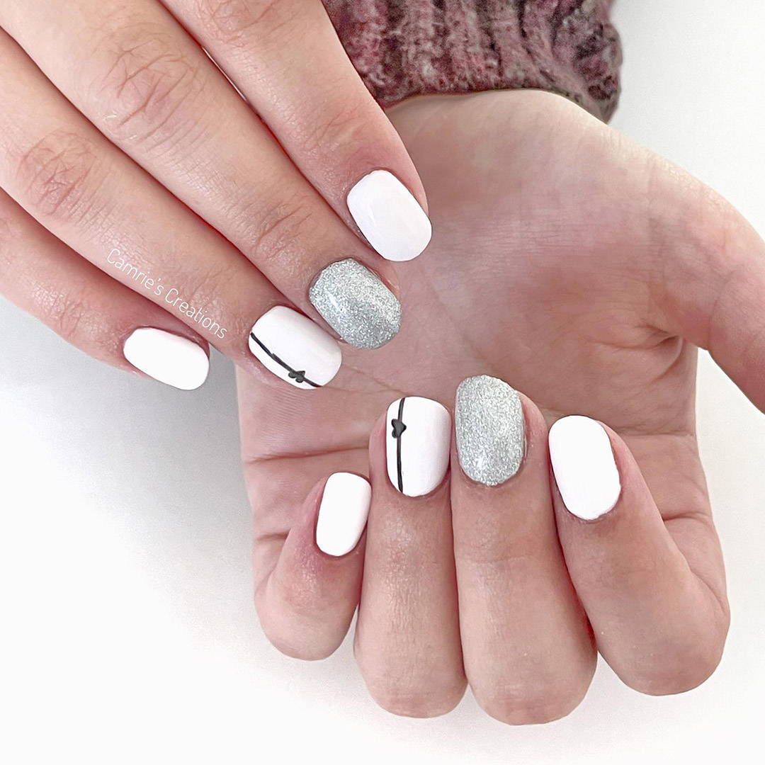 nail art with white valentines design.